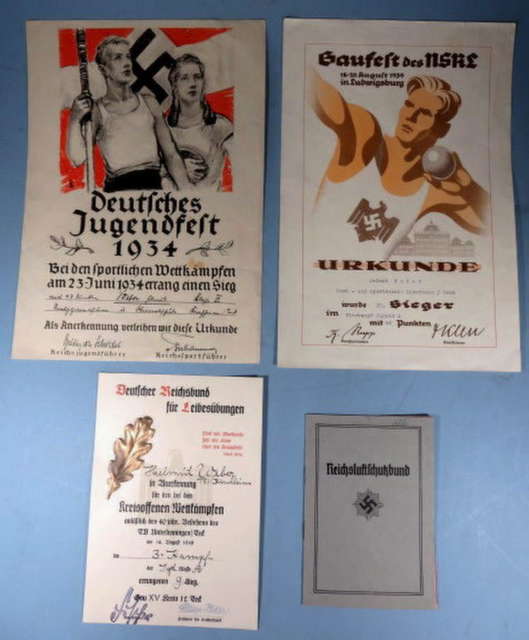 SOLD-NAZI GERMANY 1930's AWARDS DOCUMENTS NAMED 4 PIECES #828